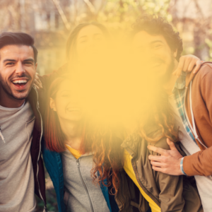Image of a group of friends laughing. The middle of the image is completely blurred out